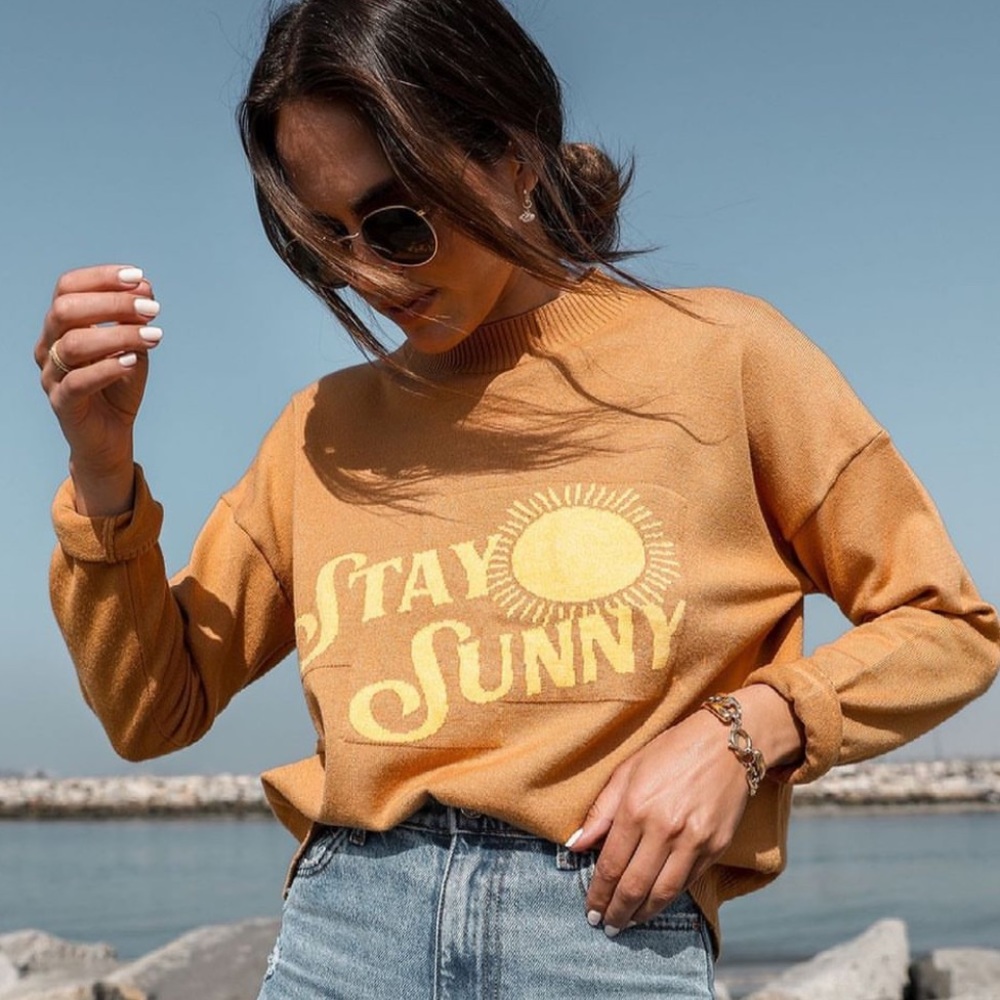 Stitch and feather sweater